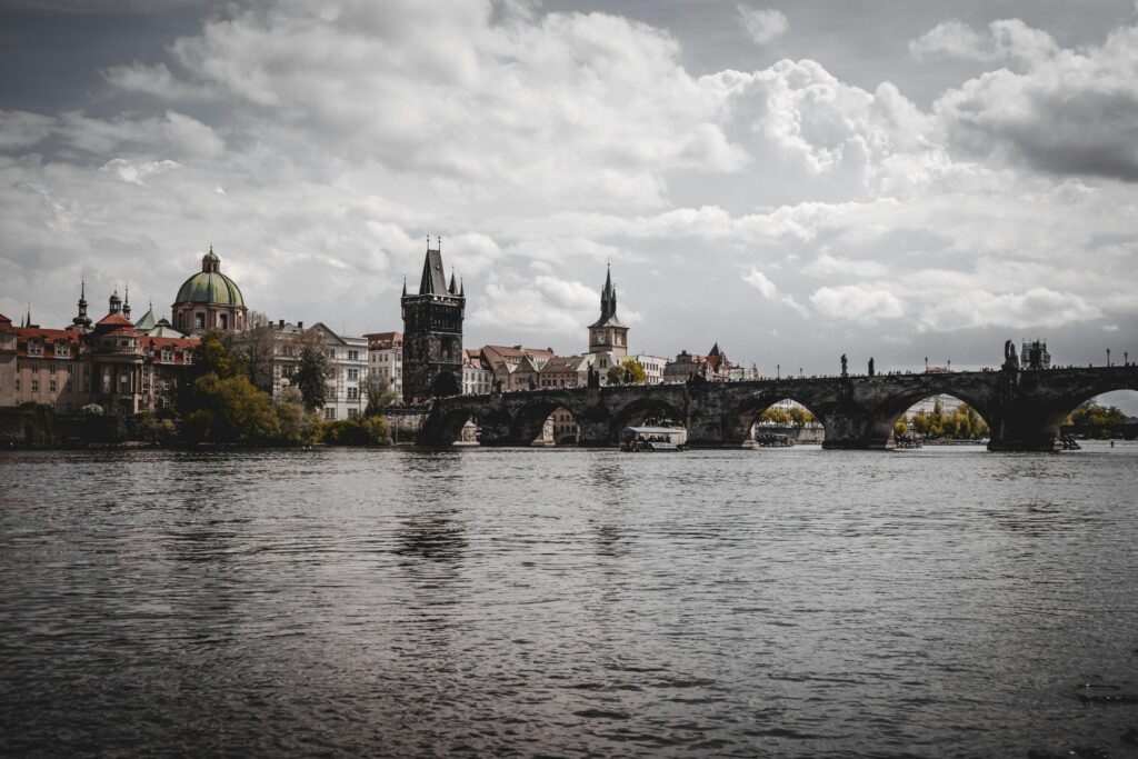 Charles Bridge Prague view from Vltava River near Hotel Haštal