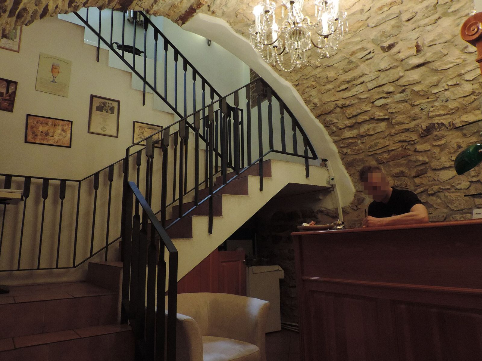 Stone-vaulted staircase inside Beer Spa Bernard, a spa near Hotel Haštal