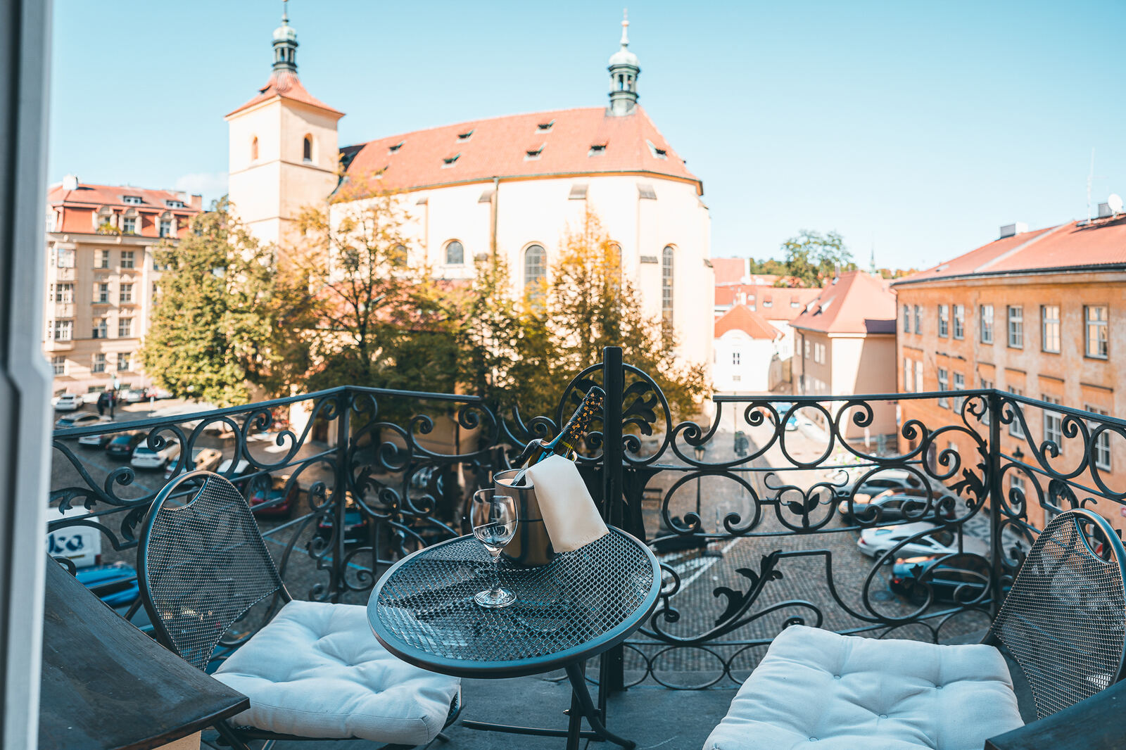 View of the Church of St. Castulus from a balcony at Hotel Haštal Prague